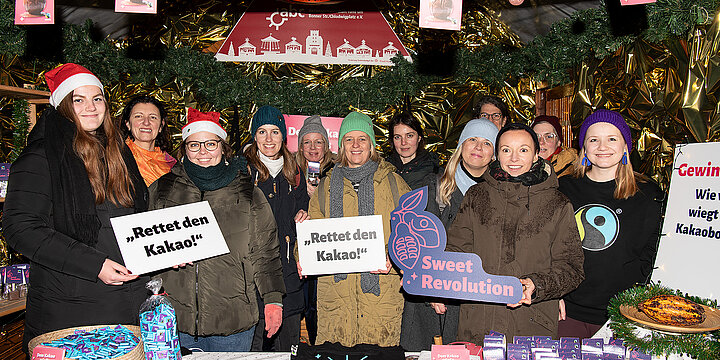 Weihnachtsmarktstand mit Aktion zur Kampagne "Sweet Revolution"